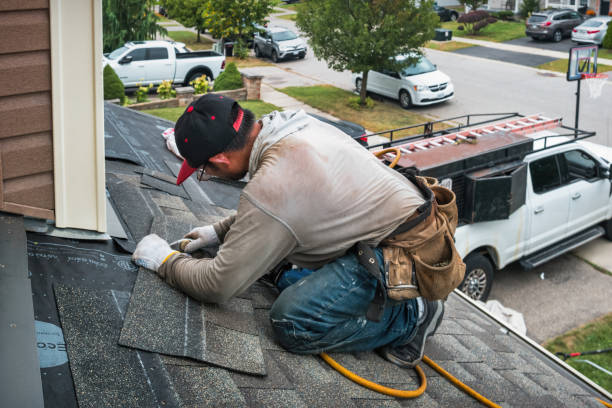 Professional Storm Damage Roof Repair technician working in Meridian, NY